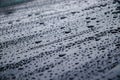 Water drops on a gray metal surface.Water drops on metal background. Royalty Free Stock Photo