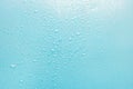 Water drops on a green, blue background. Texture top view Royalty Free Stock Photo