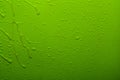 Water drops on green color  surface Royalty Free Stock Photo