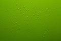 Water drops on green color  plastic surface Royalty Free Stock Photo