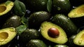 Water Drops on Group of Fresh Green Avocados As Background Selective Focus