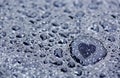 Water drops and heart reflection.
