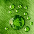 Water drops on leaf and recycle logo Royalty Free Stock Photo