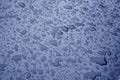 Water drops on metal surface in blue color. Royalty Free Stock Photo