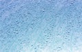 Water drops on metal surface with blur effect. Royalty Free Stock Photo