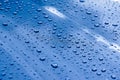 Water drops on a metalic grey car Royalty Free Stock Photo