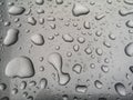 Water drops on metallic silver background closeup Royalty Free Stock Photo