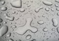Water drops on metallic silver background closeup Royalty Free Stock Photo