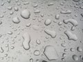 Water drops on metallic silver background closeup Royalty Free Stock Photo