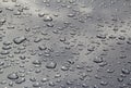 Water drops on metallic silver Royalty Free Stock Photo