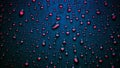 Water drops in neon lighting. Abstract background with colorful texture backdrop Royalty Free Stock Photo