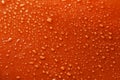 Water drops on the orange background Royalty Free Stock Photo
