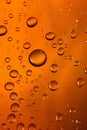 Water drops on orange background. Abstract background of water droplets. Royalty Free Stock Photo
