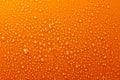 Water Drops On Orange Background Texture dark Royalty Free Stock Photo