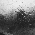 Water drops of rain in the train& x27;s window glass Royalty Free Stock Photo