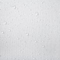 Water drops on waterproof fabric background. Raindrops on white umbrella Royalty Free Stock Photo