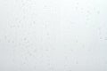 Water drops on white surface background Royalty Free Stock Photo