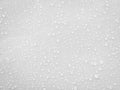 Water drops on white surface background Royalty Free Stock Photo