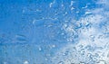 Water drops window glass blue sky Royalty Free Stock Photo