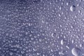 Water drops on window glass. Small droplets. Rainy wet glass, autumn background Royalty Free Stock Photo