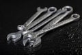 Water drops on workshop wrenches. Wet tools used in a machine shop Royalty Free Stock Photo