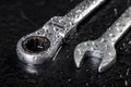 Water drops on workshop wrenches. Wet tools used in a machine shop Royalty Free Stock Photo