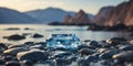 water enclosed by rocks, under a sapphire sky, hosts a small isle.