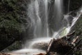 Water fall over on moss rocks Royalty Free Stock Photo