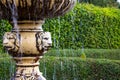 Water falling down from the ancient fountain Royalty Free Stock Photo