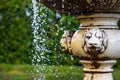 Water falling down from the ancient fountain Royalty Free Stock Photo