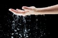 Water falling on hand Royalty Free Stock Photo