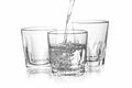 Water falling in Three glass on isolate background