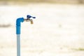Water faucet on dry land Royalty Free Stock Photo