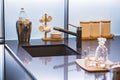 Water faucet in the modern kitchen. Concrete countertop and luxury kitchen.