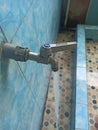 water faucet with open position and flow water from it