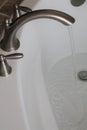 Water Faucet running in a bathtub Royalty Free Stock Photo