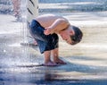 Little boy in indiana Splash pad