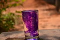 Water filled glass with spread ink Royalty Free Stock Photo