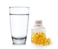 water and fish oil isolated on white background Royalty Free Stock Photo
