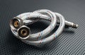 Water flexible hose in metallic braiding Royalty Free Stock Photo