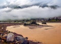 Water flood on river after heavy rain rapids water flow copiously