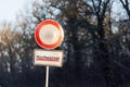 Water flood sign Hochwasser - Flood at Germany forest city park. Road close drive prohibited due Weather seasonal