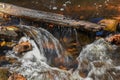 water in flow motion in trap falls brook Royalty Free Stock Photo