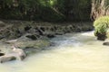 water flow over mossy rock Royalty Free Stock Photo