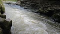 water flow over mossy rock Royalty Free Stock Photo