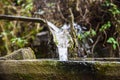 water flowing from bamboo pipe Royalty Free Stock Photo