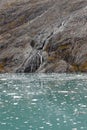 Water Flowing Down a Rocky Shore Royalty Free Stock Photo