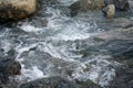 Water flowing downhill through the rocks