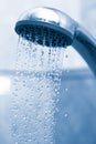 Water flowing from metal shower Royalty Free Stock Photo