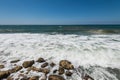 Water flowing and waves in the Mediterranean sea and blue sky at the Tel Aviv port, Israel Royalty Free Stock Photo